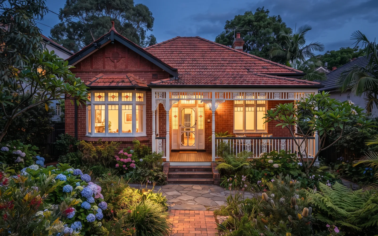 Sydney home exterior with a sold sign in warm afternoon light